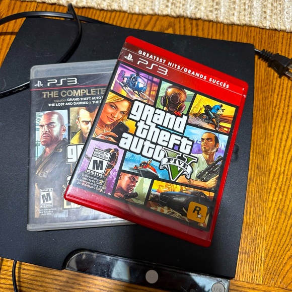Sony Other - PlayStation 3 comes with two games and two chargers